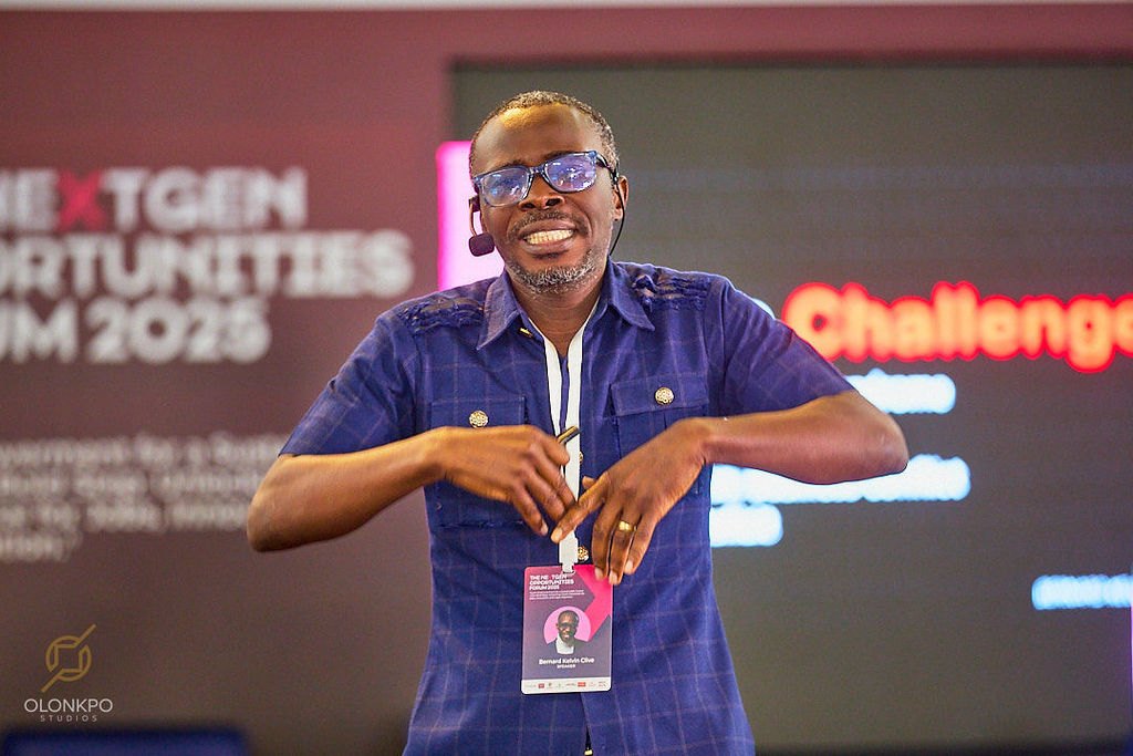 Bernard delivering an engaging presentation with a headset microphone